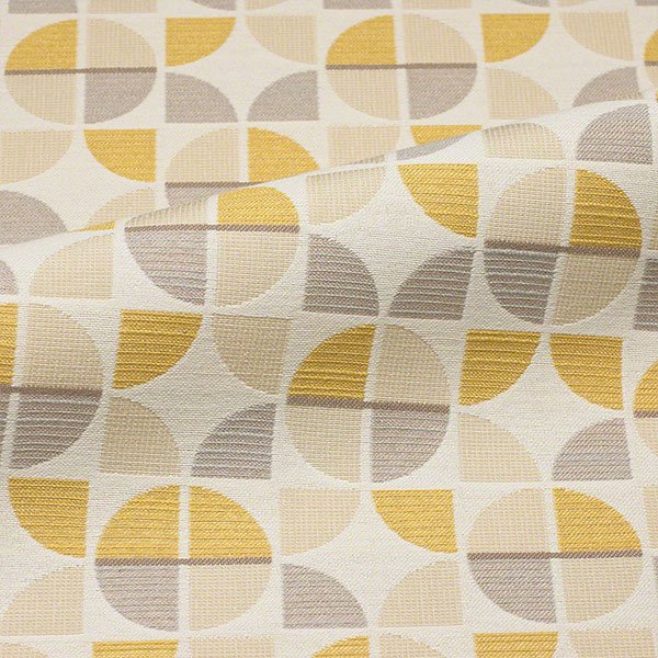 Commercial upholstery fabric with geometric pattern in yellow, grey, and neutral tones