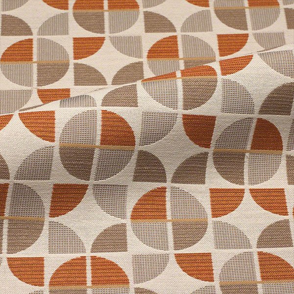 Commercial upholstery fabric with geometric pattern in orange, brown, and neutral tones
