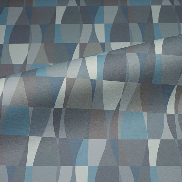 Commercial upholstery fabric with geometric pattern in blue, grey, and neutral tones