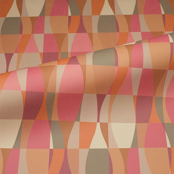 Commercial upholstery fabric with geometric pattern in orange, red, and neutral tones